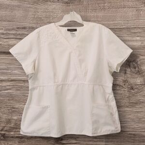 White scrub top by Baby Phat